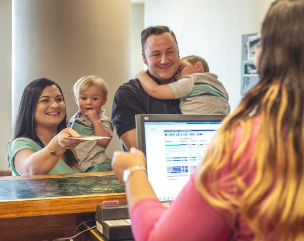 Family checking in at Beaumont Hotel