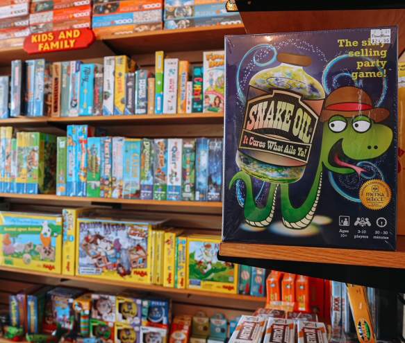 Section of kids & family games at The Game Preserve