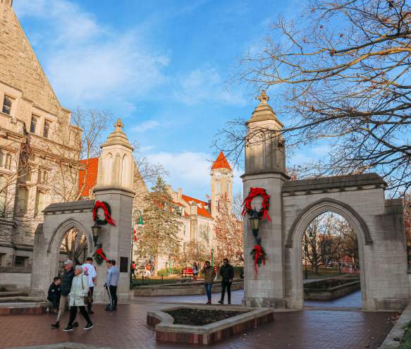 People walking through Sample Gates during a winter day