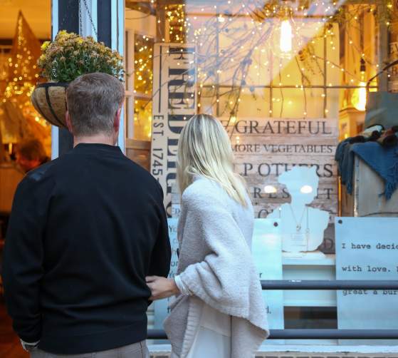 Couple window shopping in Downtown Frederick