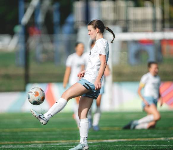 woman playing soccer