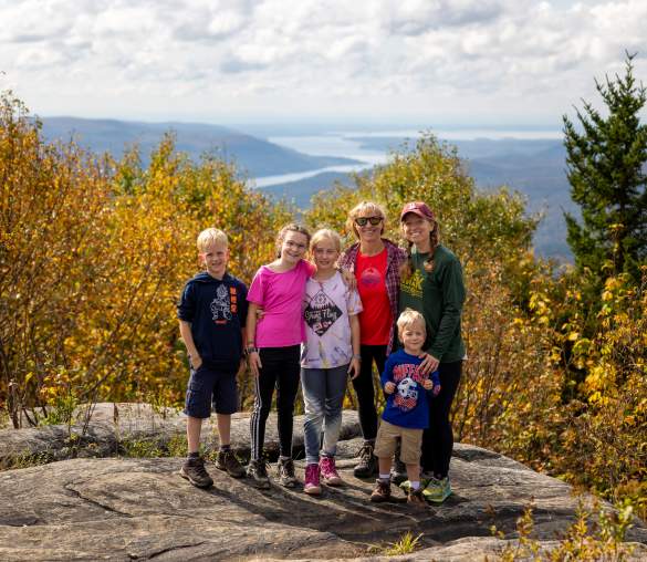 family on mountain top in Fall