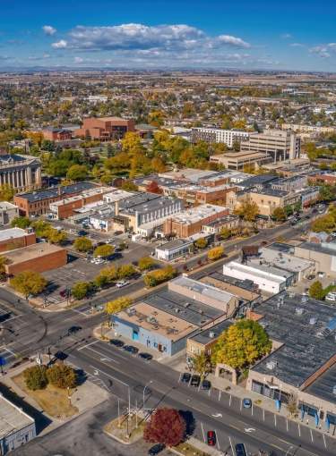 Aerial Drone View of Downtown Greeley with Mountains in Background