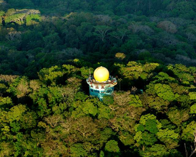 Aerial view of the Canopy Tower, a bird watching place surrounded by a lot of vegetation in Soberania National Park