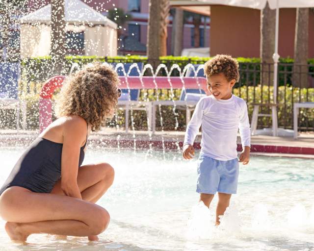 Mother and son at kiddie pool at Caribe Royale Orlando