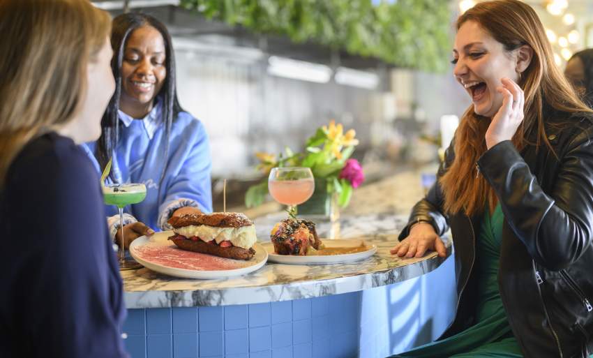 Group of Women enjoying food at Blume Restaurant in Greater Wilmington, Delaware
