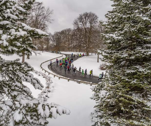 A crowd running in the snow