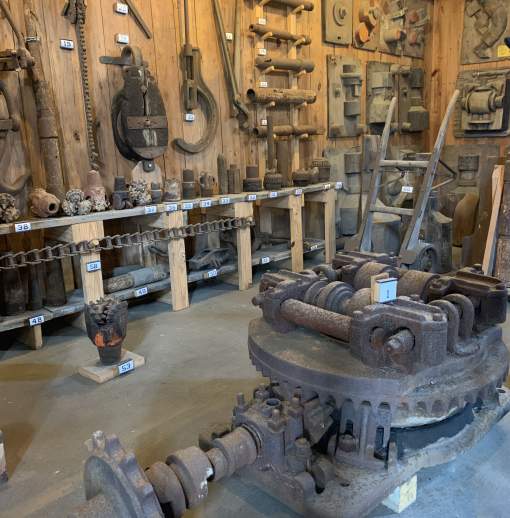 Spindletop Museum history exhibit of vintage drill bits and drilling equipment