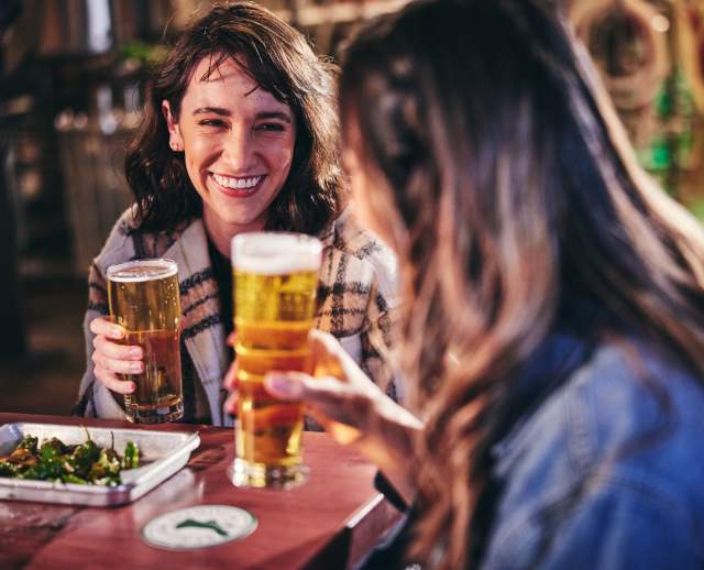 Women drinking at Bewilder Brewing