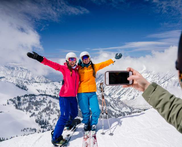 Friends at Snowbird taking a ski photo