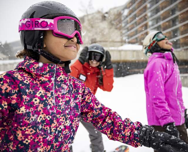Kids taking snowboarding lessons at Snowbird's Mountain School