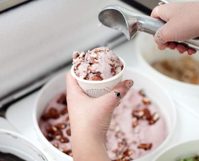 Image of a worker scooping vegan ice cream at Monkeywrench in salt lake city