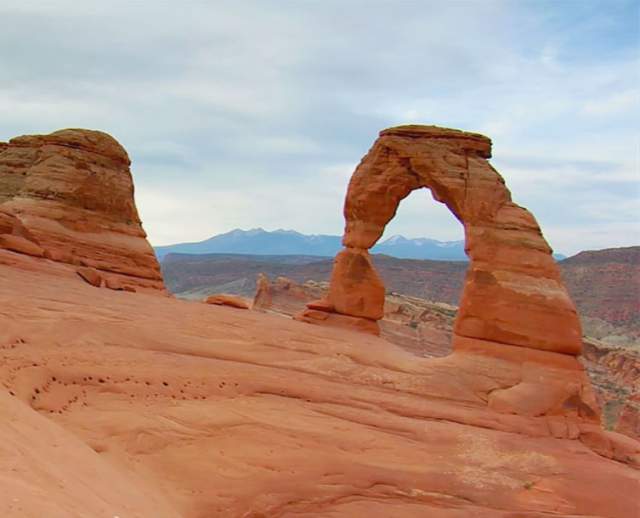 Hikers at Delicate Arch
