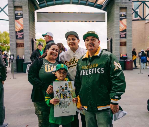Family of four at an Athletics game in Sacramento