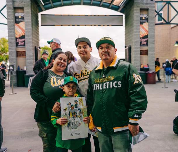 Family of four at an Athletics game in Sacramento