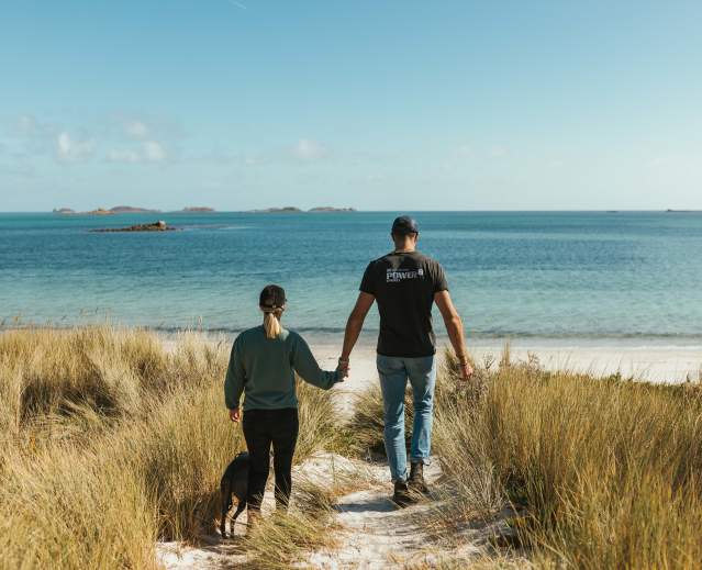 Couple walking to the beach