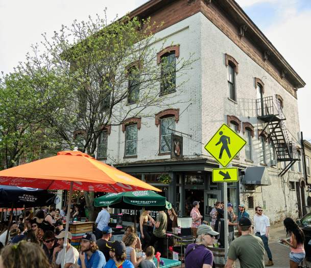 Crowded corner in downtown Winooski in the summer