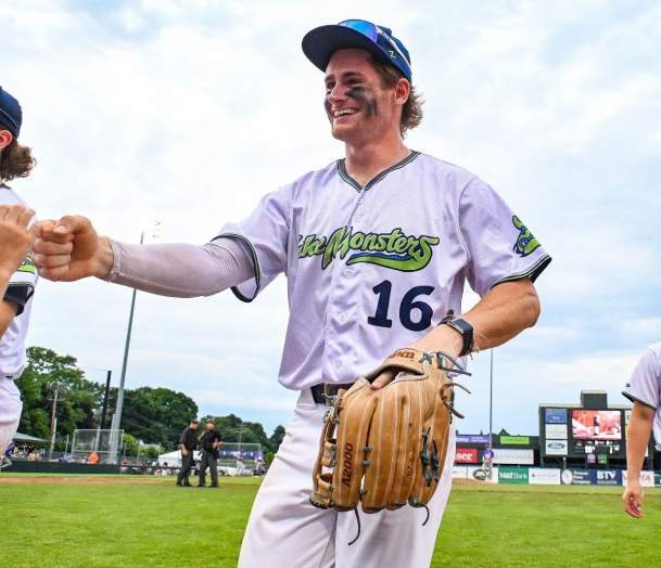 Vermont Lake Monsters playing shaking hands with teammate
