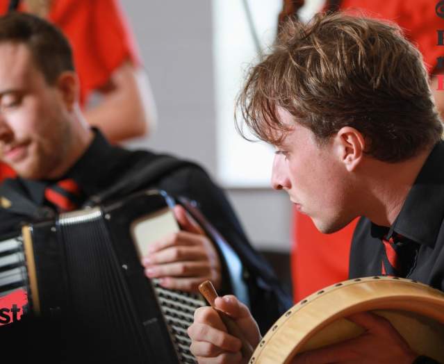 Musicians playing instruments at Fleadh Cheoil na hÉireann