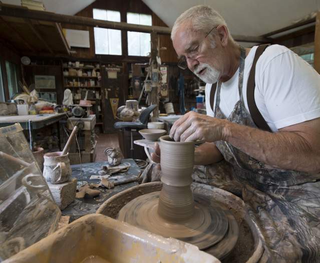 Loudoun County Potter performing pottery