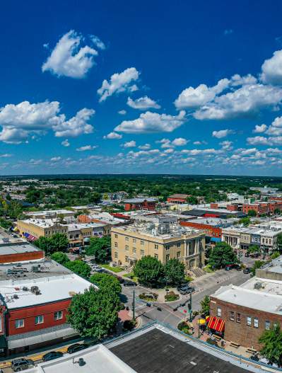 Wide angle drone shot of downtown McKinney