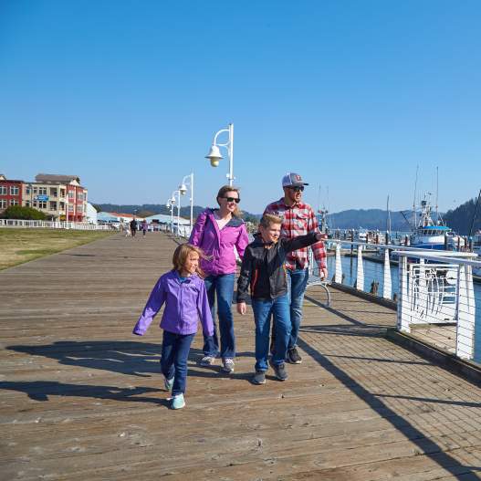 Family Enjoying Historic Old Town Florence's boardwalk.