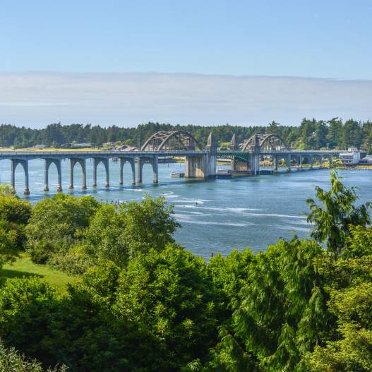 A view showing the historic Siuslaw Bridge over the Siuslaw River.