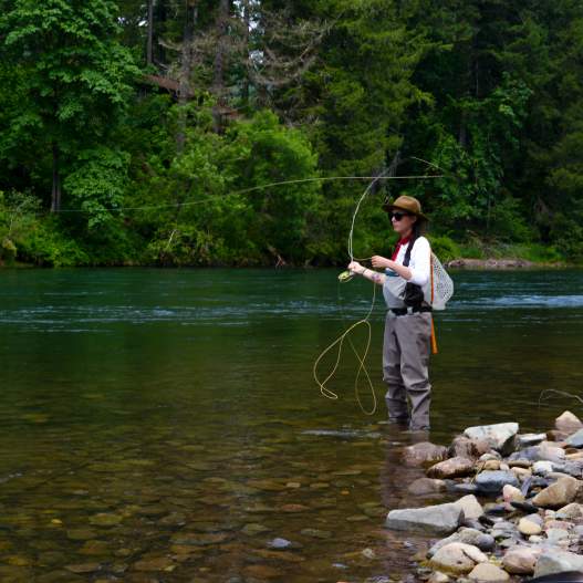 Woman Fly Fishing on the McKenzie River