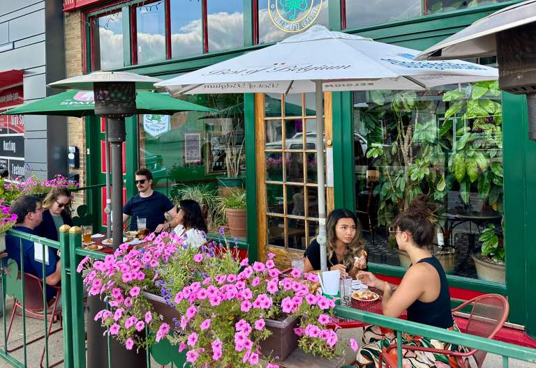 A group of people dining on the patio at Sonka's Irish Pub in Terre Haute, Indiana