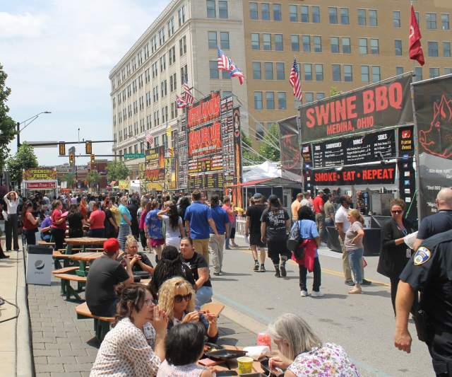 People walking downtown during the Rib White, & Blue Festival