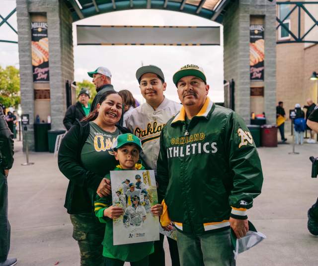 Family of four at an Athletics game in Sacramento