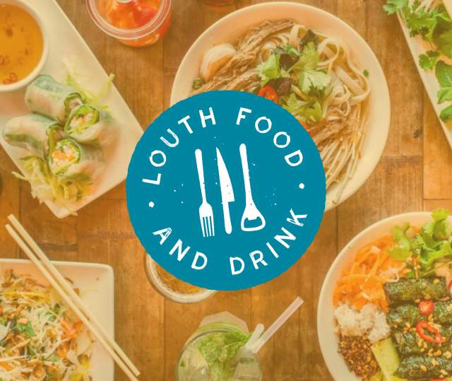 a table of food with the 'Louth food & drink' logo on top