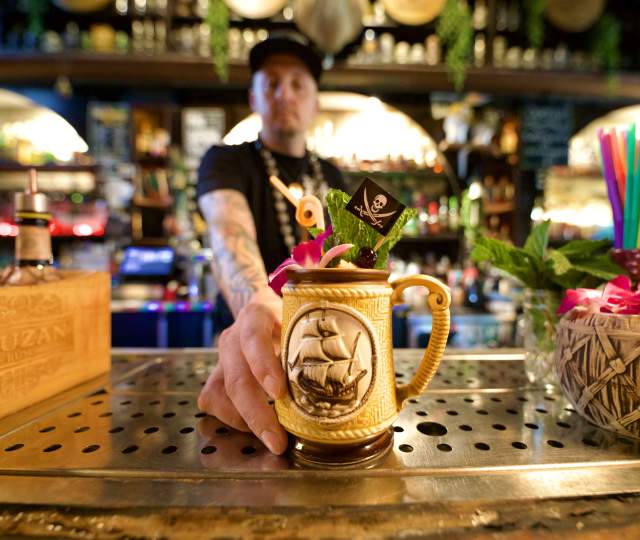 Mobile Tiki week drink served by Trader Roy in The Haberdasher bar