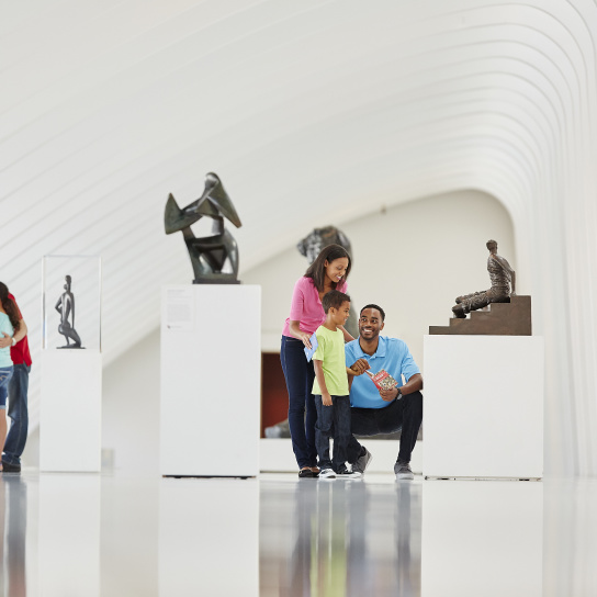 Familes looking around the Milwaukee Art Museum