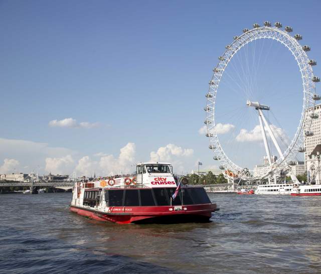 City Cruises boat inf front of London Eye