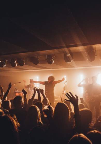 Band performing on stage in front of a crowd