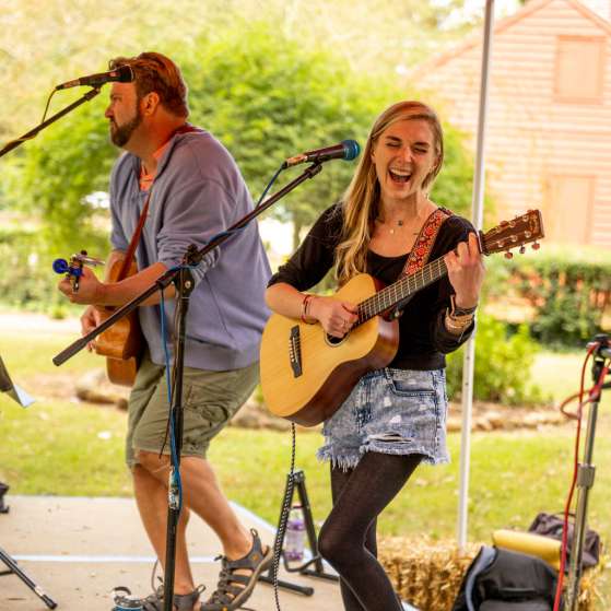 Man and woman performing