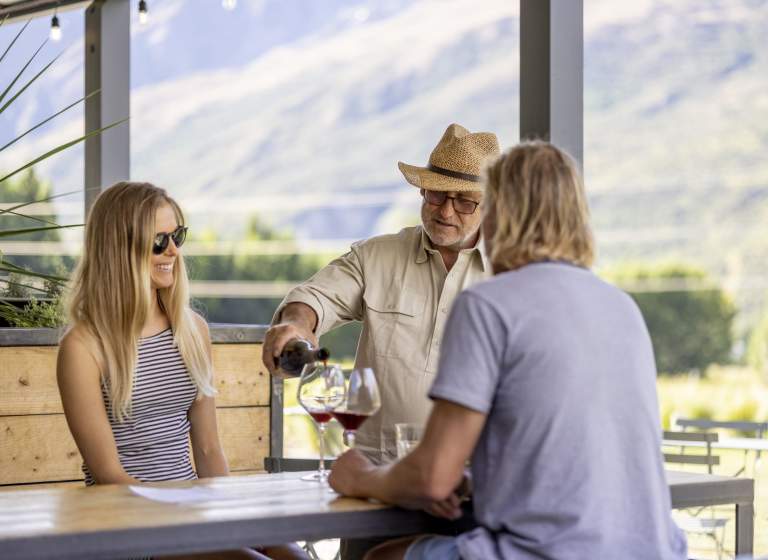People enjoying a wine tasting in summer at Mt Rosa Wines