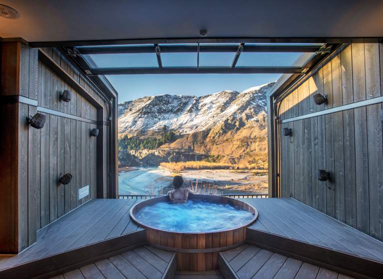 Woman relaxing in Onsen Hot Pools in Winter