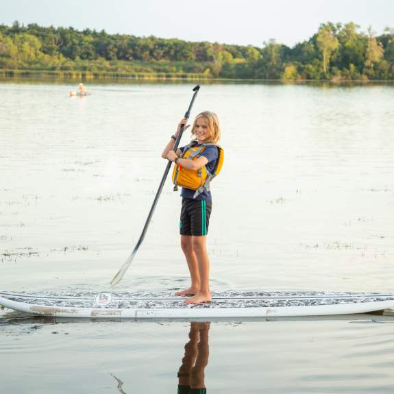 Stand-up paddleboarding on the lake