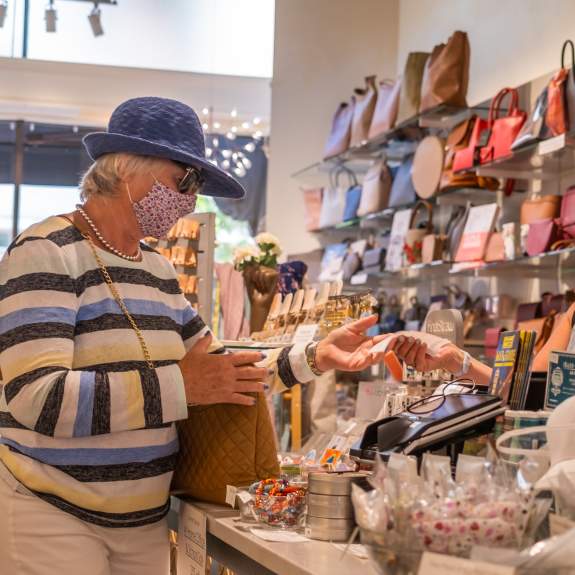 A woman shopping at a store during the COVID-19 pandemic