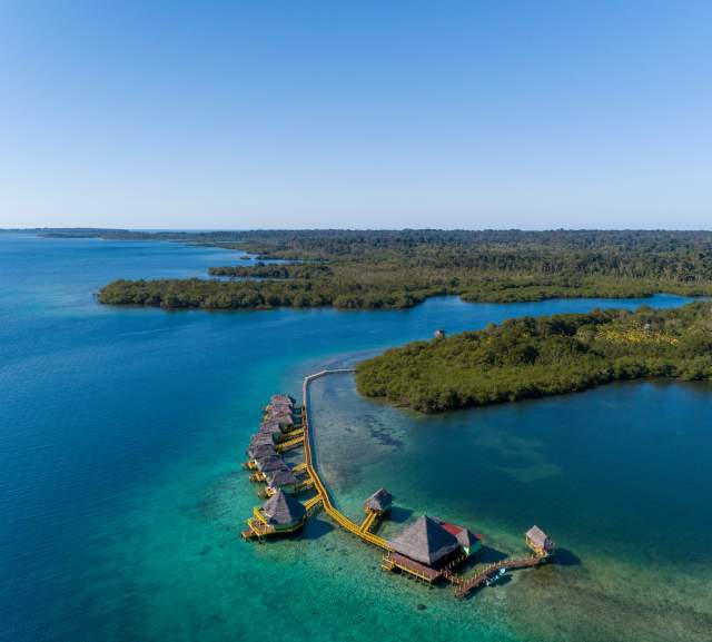 overview of lodging extending into ocean from Panama