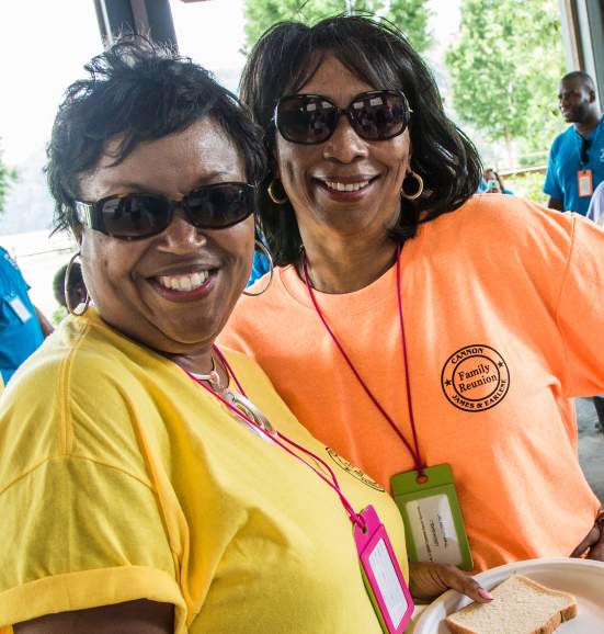 Two women with beautiful smiles enjoying their Family Reunion at Morgan Falls Overlook Pavilion