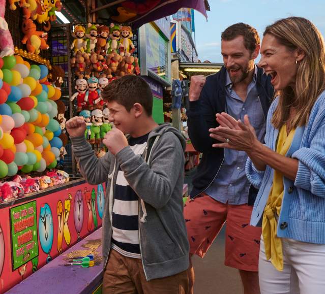 Family Playing Games at the Pier