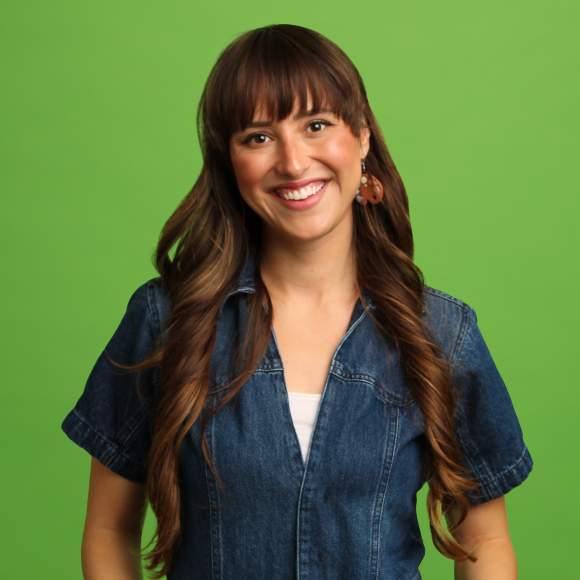 Audrey Hall headshot on green background