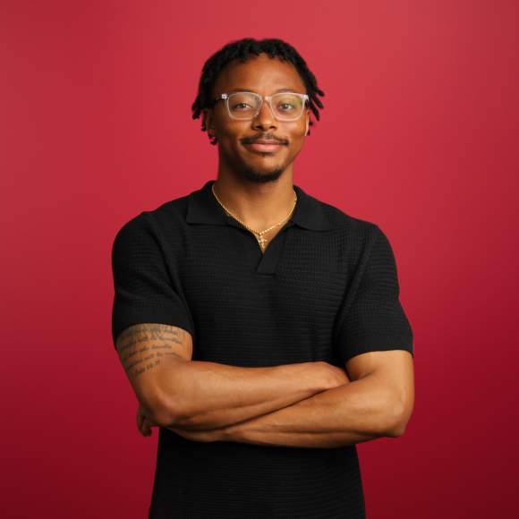 Nehemiah Jackson headshot on crimson background