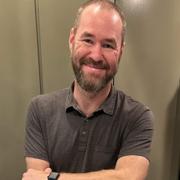 Logan Oates headshot