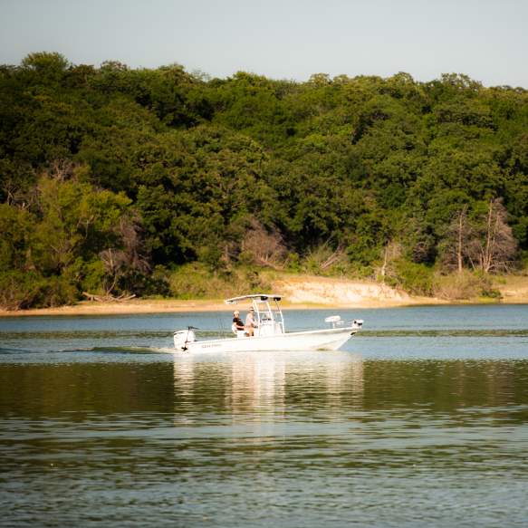 Two men on a fishing boat on Lake Texoma