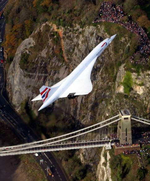 A view of Concorde Alpha Foxtrot flying over the Clifton Suspension Bridge in West Bristol during its final flight in November 2003 - credit SWNS Group