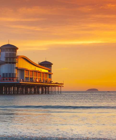 A view of the Grand Pier in Weston-super-Mare near Bristol at sunset - credit Dave Peters
